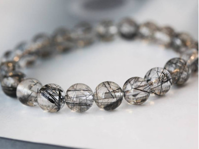 Tourmalinated Quartz 9-10mm Round Bracelet Tourmalinated Quartz 9-10mm Round Bracelet