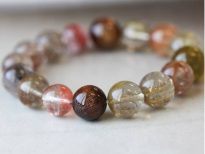 Rutilated Quartz 11-14mm Round Bracelet Rutilated Quartz 11-14mm Round Bracelet